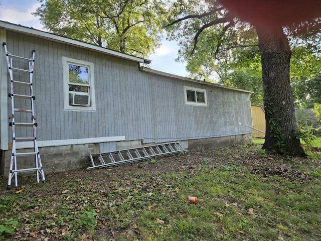 view of home's exterior featuring cooling unit