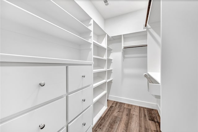 walk in closet featuring wood-type flooring