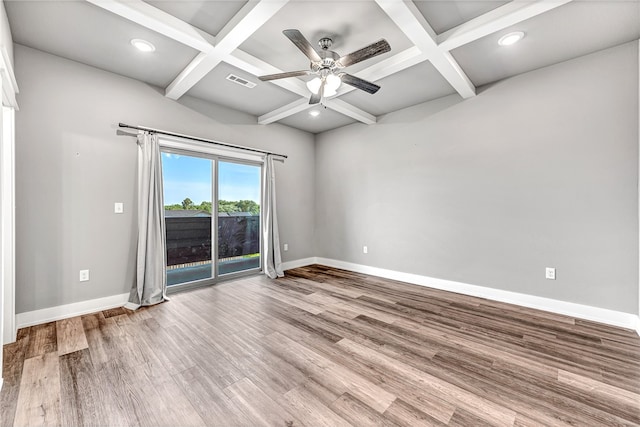 unfurnished room with hardwood / wood-style floors, beamed ceiling, coffered ceiling, and ceiling fan