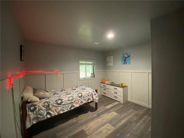 bedroom featuring dark hardwood / wood-style floors