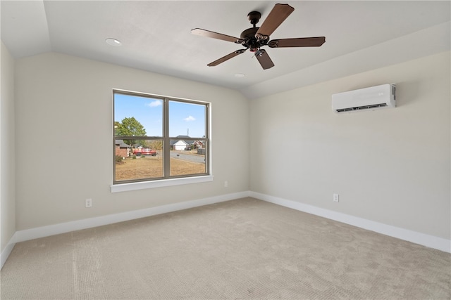 carpeted spare room featuring an AC wall unit, vaulted ceiling, and ceiling fan