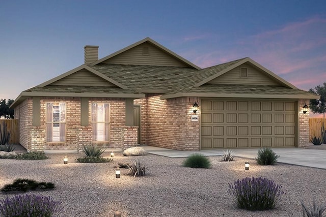 view of front of home with a garage, a chimney, concrete driveway, and brick siding