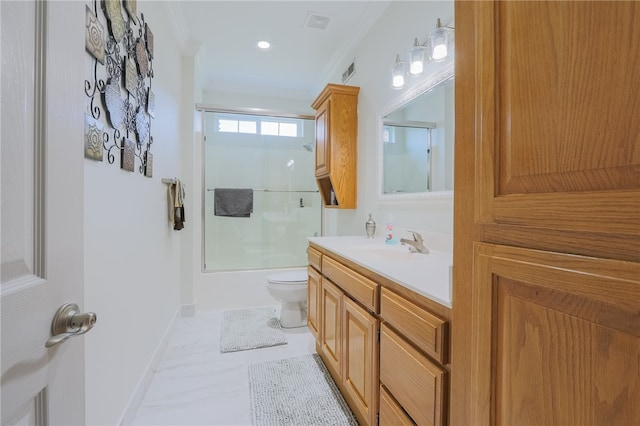 full bathroom featuring toilet, combined bath / shower with glass door, vanity, and ornamental molding