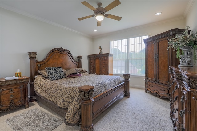 bedroom featuring light carpet, ceiling fan, and crown molding