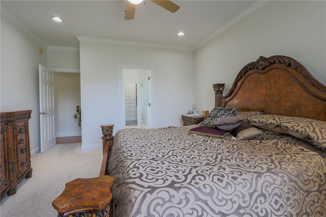 carpeted bedroom with crown molding, ceiling fan, and ensuite bathroom