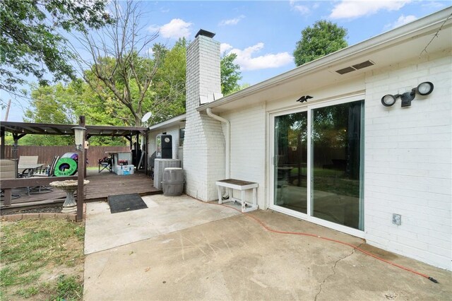 view of patio featuring a wooden deck