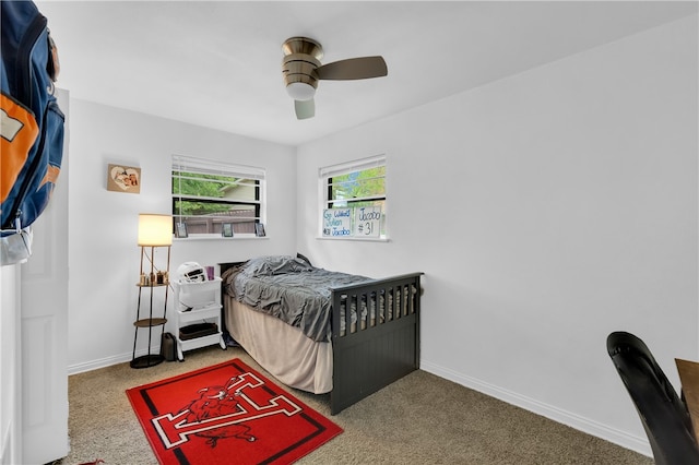 carpeted bedroom featuring ceiling fan