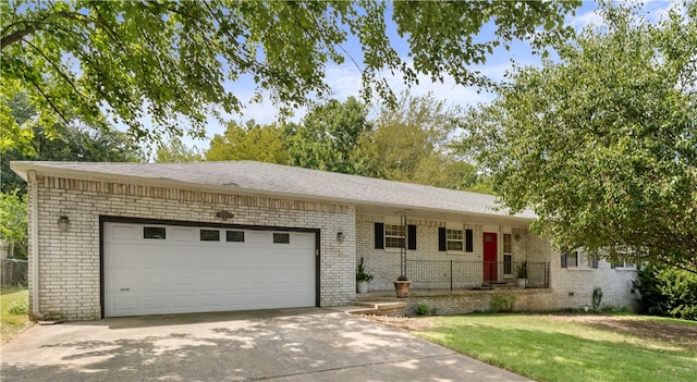 ranch-style house with a garage and a front yard