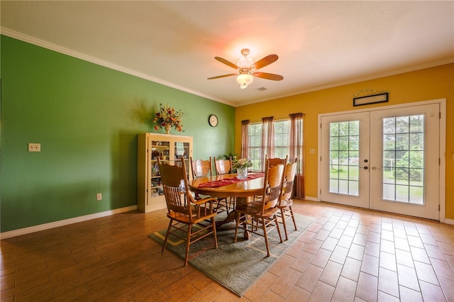 dining room with a textured ceiling, french doors, hardwood / wood-style floors, ceiling fan, and ornamental molding