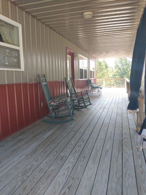 wooden terrace with covered porch