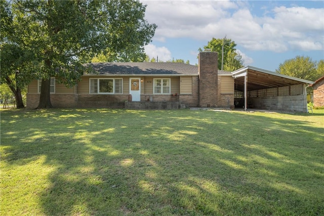 ranch-style home featuring a front yard and a carport