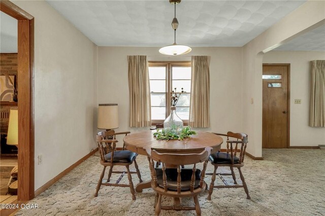 view of carpeted dining space