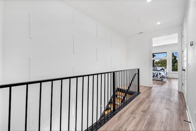 hallway with light wood-type flooring