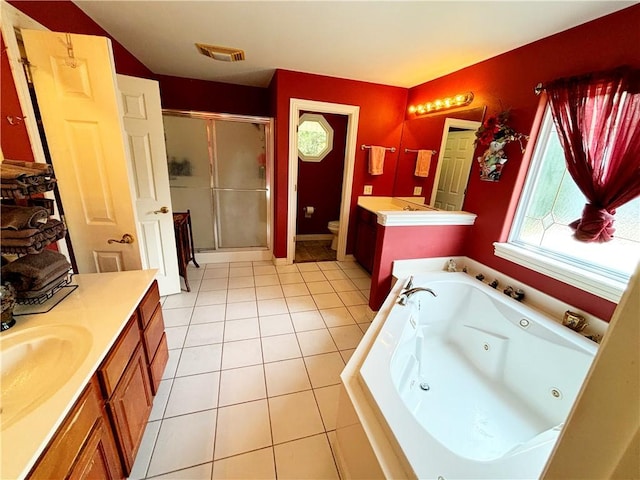 full bathroom featuring visible vents, toilet, a shower stall, vanity, and tile patterned flooring