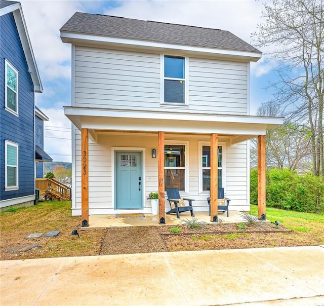 view of front of home featuring covered porch