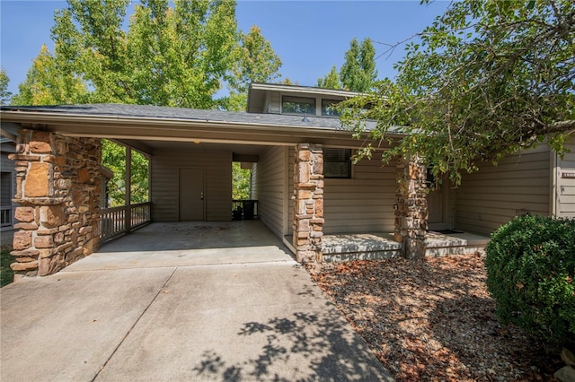 view of front of property with a carport