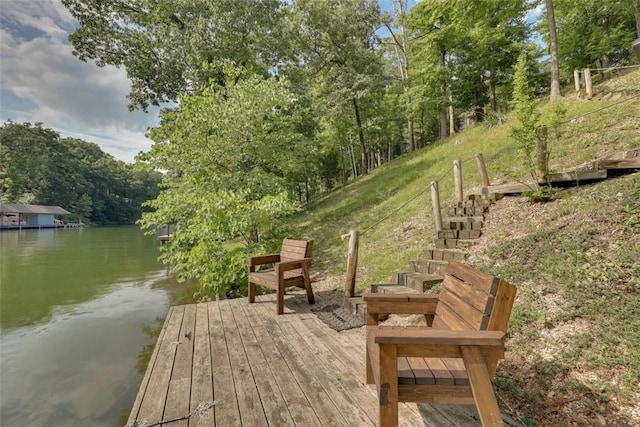 dock area with a deck with water view