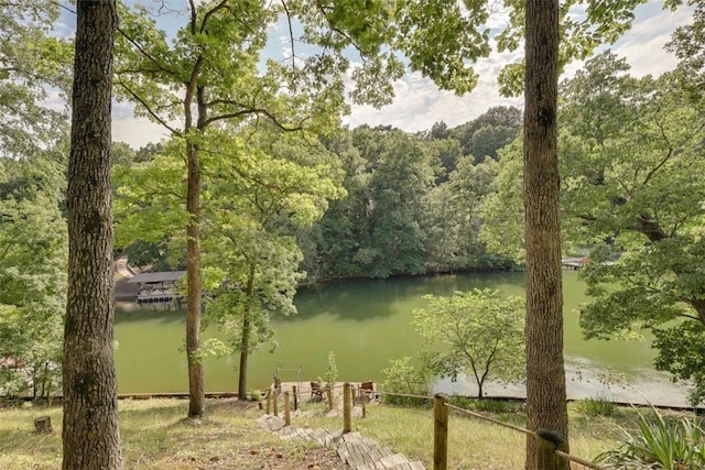 water view featuring a wooded view