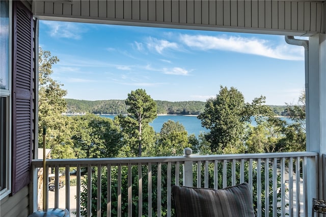 balcony featuring a water view