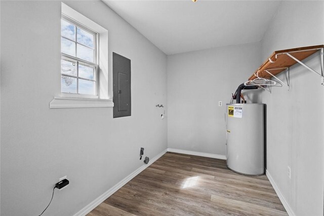 57110 59th Hwy, Kansas, OK 74338 - laundry area featuring water heater, electric panel, and light hardwood / wood-style floors