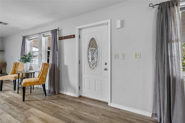 entrance foyer with hardwood / wood-style flooring