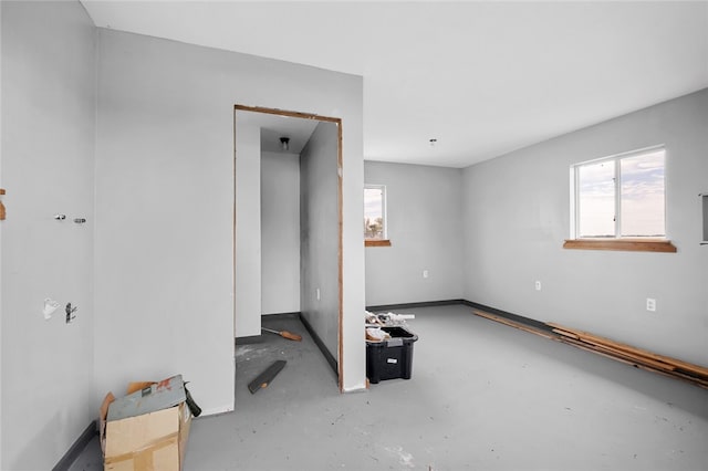 empty room featuring concrete flooring