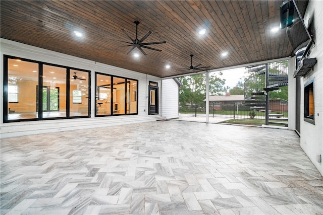 view of patio featuring ceiling fan