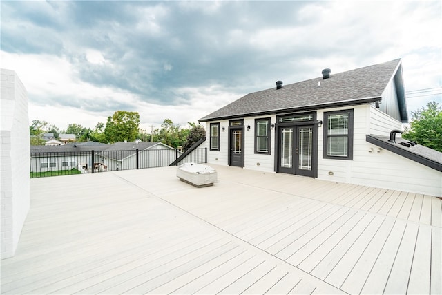 wooden deck with french doors