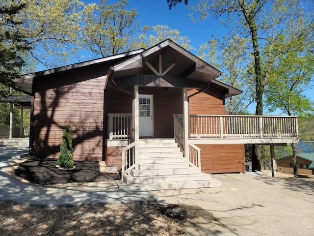 view of front of home with a deck