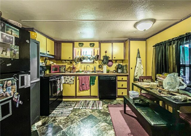 kitchen featuring black appliances and sink