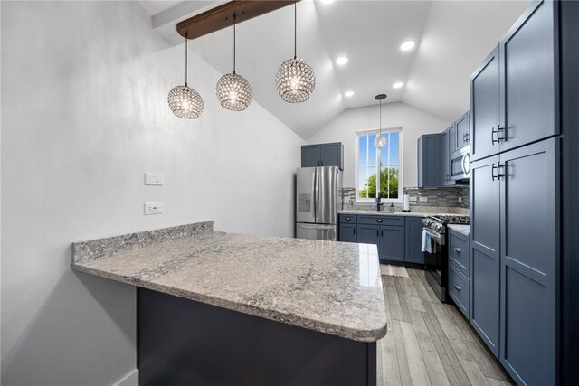 kitchen featuring hanging light fixtures, light wood-type flooring, stainless steel appliances, kitchen peninsula, and decorative backsplash