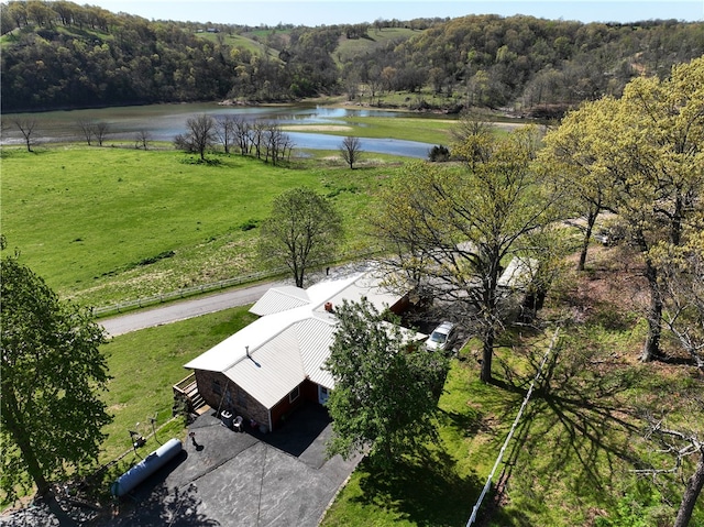 bird's eye view featuring a water view and a rural view