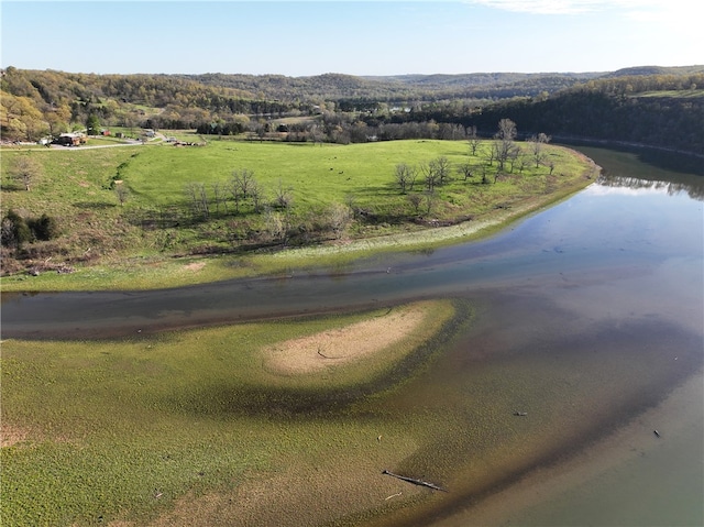 aerial view featuring a rural view and a water view