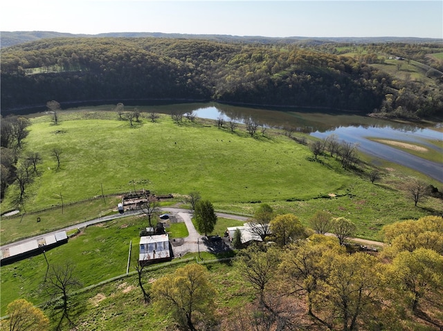 birds eye view of property featuring a water view and a rural view