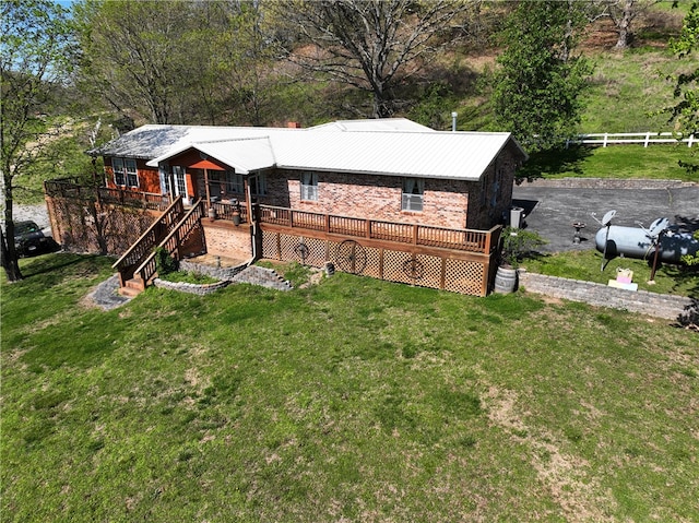 view of yard with a wooden deck