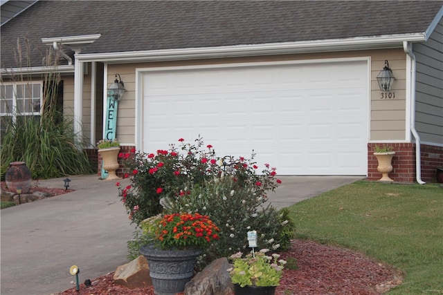 garage with a yard