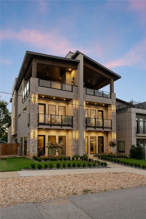 contemporary home featuring a balcony