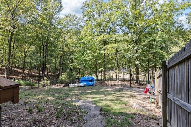 view of yard with a fenced backyard