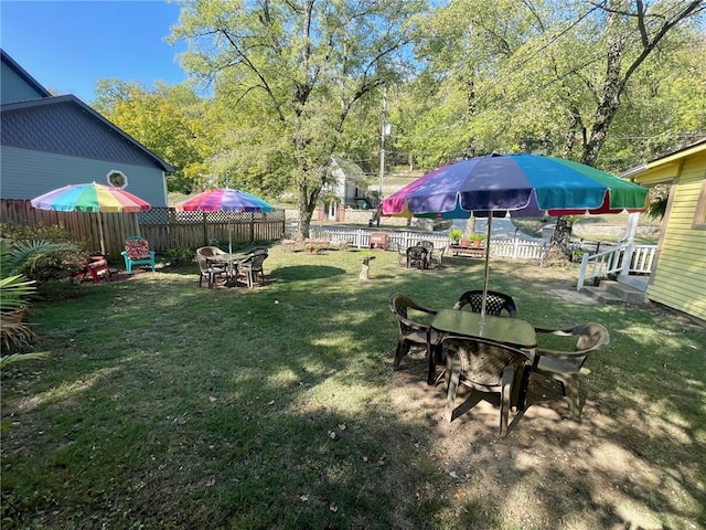 view of yard with an outdoor fire pit