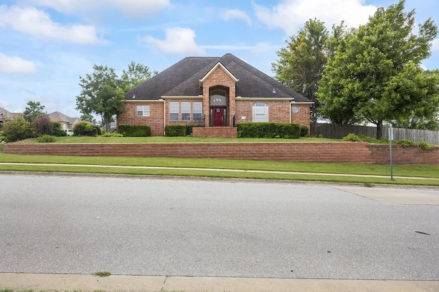 view of front of home with a front yard