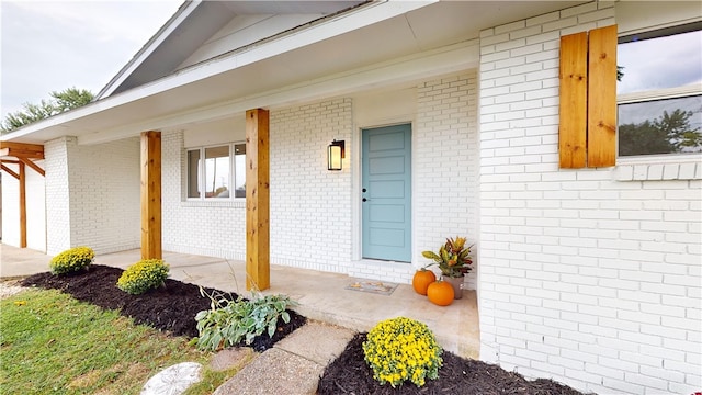 entrance to property with a porch