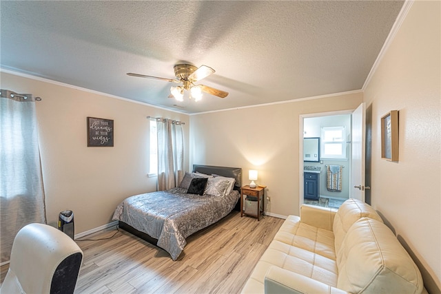 bedroom featuring multiple windows, a textured ceiling, ceiling fan, and light hardwood / wood-style flooring