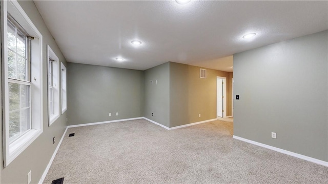 11566 Hickory Dr, Garfield, AR 72732 - carpeted empty room featuring baseboards, plenty of natural light, and recessed lighting
