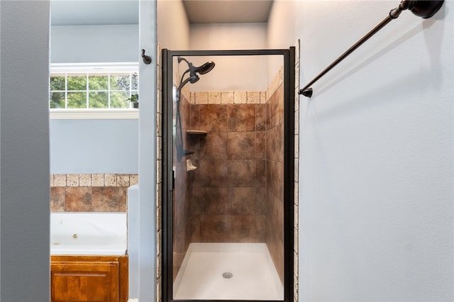 bathroom with independent shower and bath