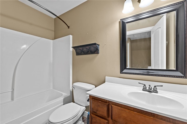 full bathroom featuring vanity, toilet, and shower / washtub combination