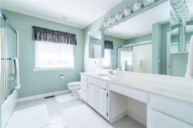 full bathroom with bath / shower combo with glass door, vanity, toilet, and tile patterned flooring