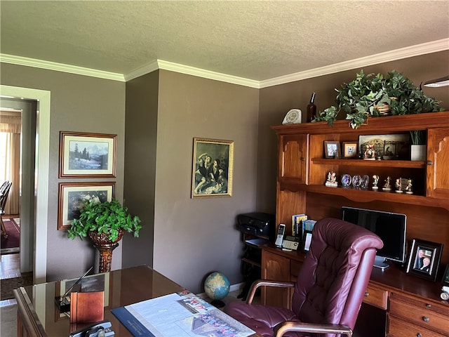 office space with a textured ceiling and ornamental molding