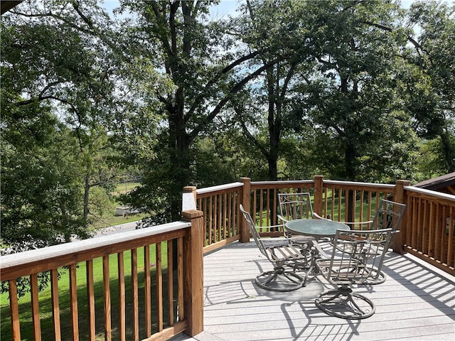 wooden deck with a yard