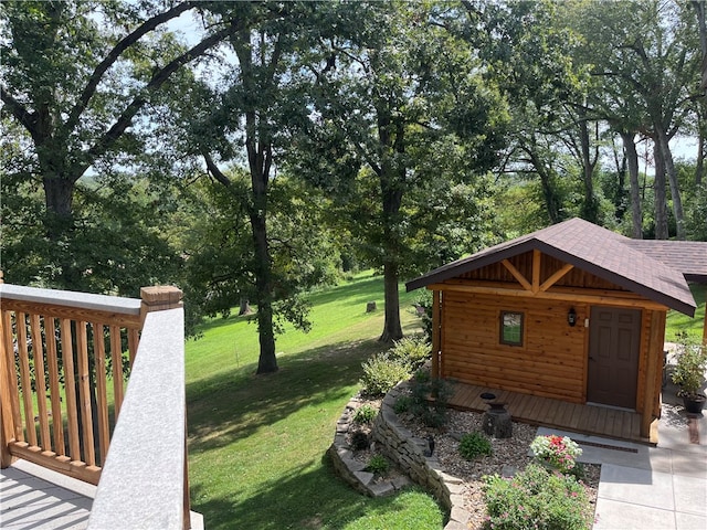 view of property exterior with a yard