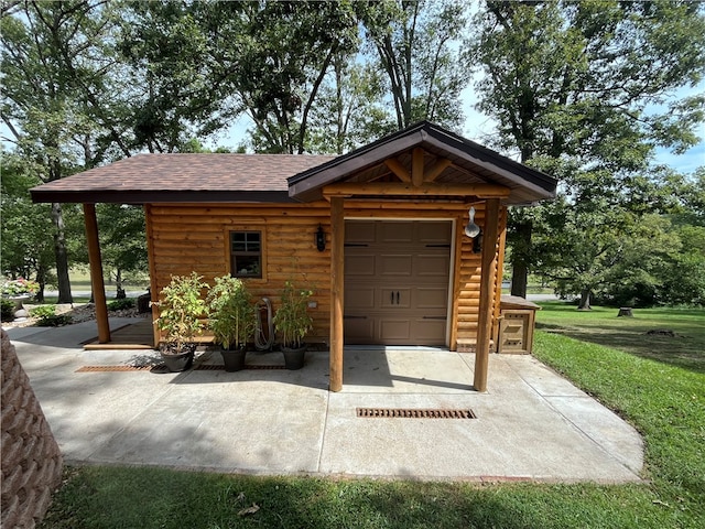 view of outdoor structure with a lawn